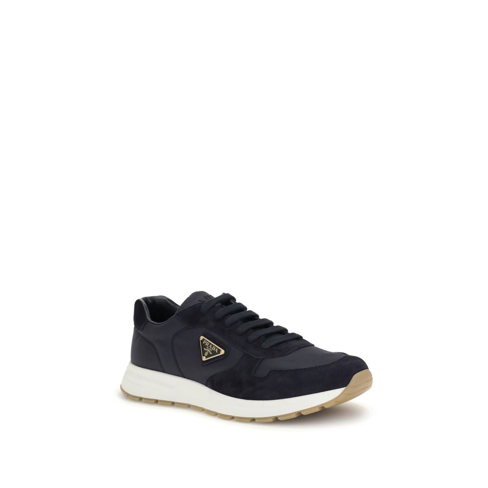 Blue Recycled Polyamide Athletic SneakersPrax 01 re-nylon Sneakers by Prada blend contemporary aesthetics and innovative materials. The upper with nylon lace loops lends a technical, modern look, enhanced by the enameled metal triangle logo and screen-pri