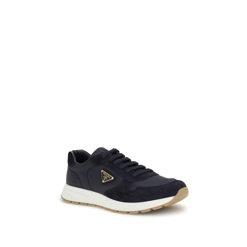 Blue Recycled Polyamide Athletic SneakersPrax 01 re-nylon Sneakers by Prada blend contemporary aesthetics and innovative materials. The upper with nylon lace loops lends a technical, modern look, enhanced by the enameled metal triangle logo and screen-pri
