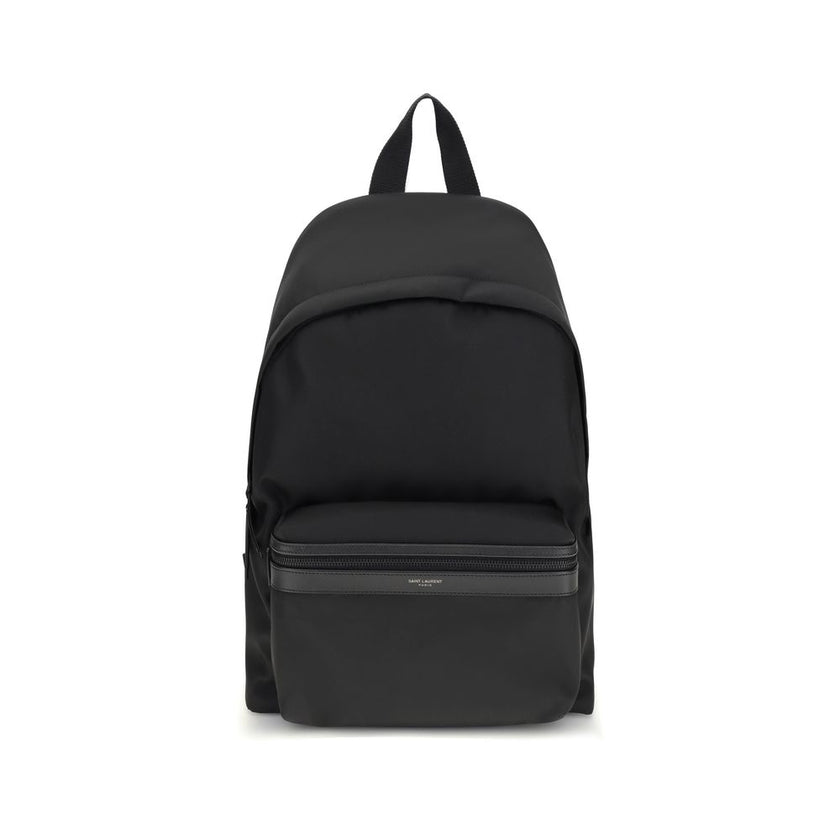 Black Recycled Polyamide BackpackThe Saint Laurent City canvas Backpack combines urban style and sustainability. Crafted with recycled polyamide lining, it features matte black hardware for a modern, refined touch. The two-way zip closure ensures practica