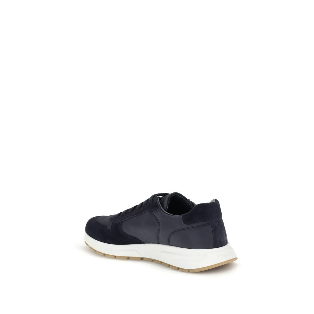 Blue Recycled Polyamide Athletic SneakersPrax 01 re-nylon Sneakers by Prada blend contemporary aesthetics and innovative materials. The upper with nylon lace loops lends a technical, modern look, enhanced by the enameled metal triangle logo and screen-pri