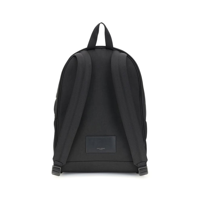 Black Recycled Polyamide BackpackThe Saint Laurent City canvas Backpack combines urban style and sustainability. Crafted with recycled polyamide lining, it features matte black hardware for a modern, refined touch. The two-way zip closure ensures practica