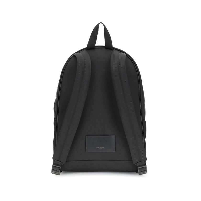 Black Recycled Polyamide BackpackThe Saint Laurent City canvas Backpack combines urban style and sustainability. Crafted with recycled polyamide lining, it features matte black hardware for a modern, refined touch. The two-way zip closure ensures practica
