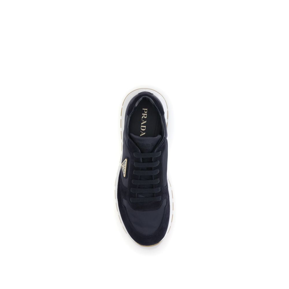 Blue Recycled Polyamide Athletic SneakersPrax 01 re-nylon Sneakers by Prada blend contemporary aesthetics and innovative materials. The upper with nylon lace loops lends a technical, modern look, enhanced by the enameled metal triangle logo and screen-pri