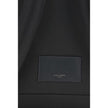 Black Recycled Polyamide BackpackThe Saint Laurent City canvas Backpack combines urban style and sustainability. Crafted with recycled polyamide lining, it features matte black hardware for a modern, refined touch. The two-way zip closure ensures practica