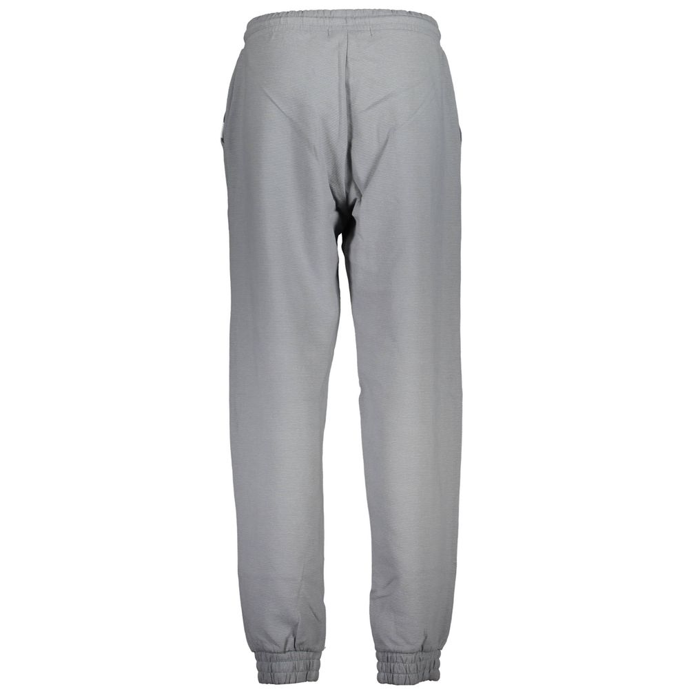 Gray Cotton Pantsports trousers, elasticated waist, elastic at the ankle, 2 pockets, application, logo, 50% transitional cottonGray Cotton Pant${tagsCalvin KleinAulae Gray Cotton Pant Calvin KleinAulae Gray Cotton Pant sports trousers, elasticated waist,