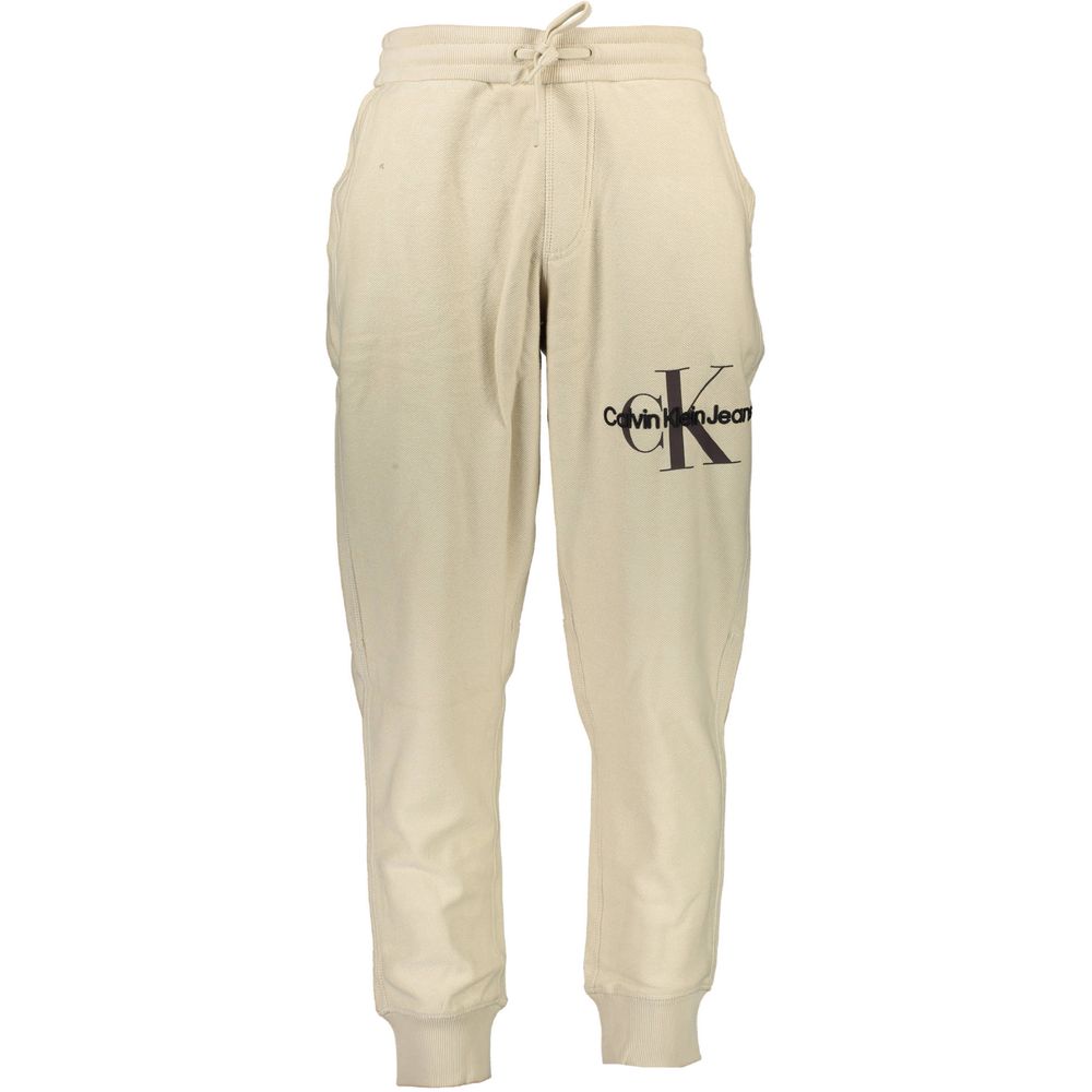 Beige Cotton Pantsports trousers, elastic waist with laces, elastic at the ankle, 3 pockets, embroidery, contrasting details, logoBeige Cotton Pant${tagsCalvin KleinAulae Beige Cotton Pant Calvin KleinAulae Beige Cotton Pant sports trousers, elastic waist