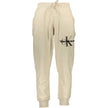 Beige Cotton Pantsports trousers, elastic waist with laces, elastic at the ankle, 3 pockets, embroidery, contrasting details, logoBeige Cotton Pant${tagsCalvin KleinAulae Beige Cotton Pant Calvin KleinAulae Beige Cotton Pant sports trousers, elastic waist