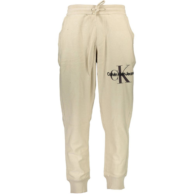 Beige Cotton Pantsports trousers, elastic waist with laces, elastic at the ankle, 3 pockets, embroidery, contrasting details, logoBeige Cotton Pant${tagsCalvin KleinAulae Beige Cotton Pant Calvin KleinAulae Beige Cotton Pant sports trousers, elastic waist