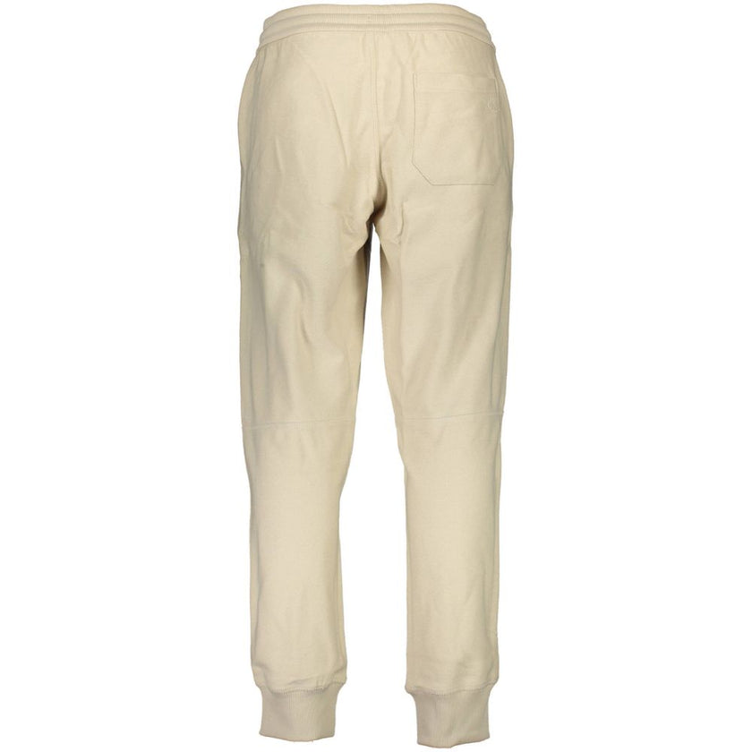 Beige Cotton Pantsports trousers, elastic waist with laces, elastic at the ankle, 3 pockets, embroidery, contrasting details, logoBeige Cotton Pant${tagsCalvin KleinAulae Beige Cotton Pant Calvin KleinAulae Beige Cotton Pant sports trousers, elastic waist