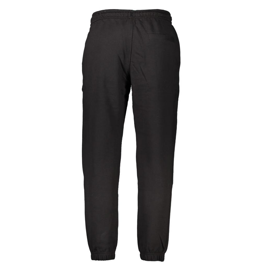 Black Cotton PantSPORTS TROUSERS, ELASTIC WAIST WITH LACES, BRUSHED, 3 POCKETS, ELASTIC AT THE ANKLE, PRINT, LOGO, 95% REGENERATIVE COTTONBlack Cotton Pant${tagsCalvin KleinAulae Black Cotton Pant Calvin KleinAulae Black Cotton Pant SPORTS TROUSERS, ELAST