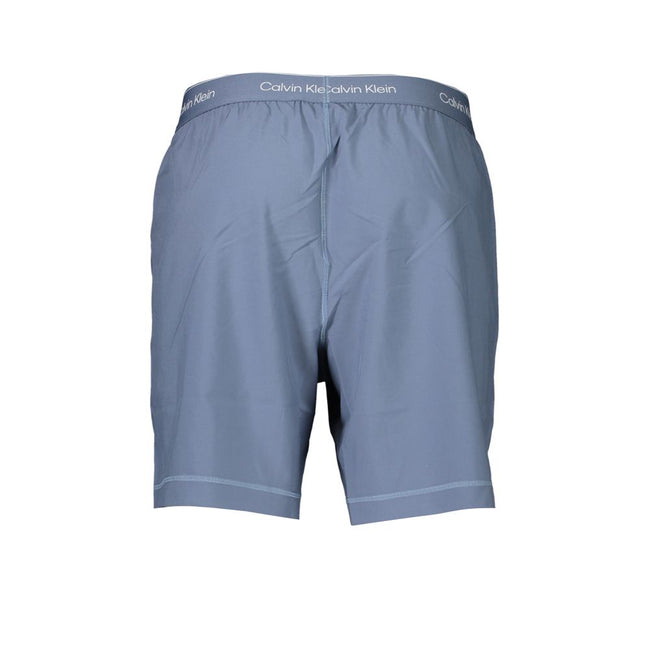 Blue Polyester PantSPORT SHORT, ELASTIC WAIST, 2 POCKETS, PRINT, ELASTIC AND BREATHABLE FABRIC, LOGOBlue Polyester Pant${tagsCalvin KleinAulae Blue Polyester Pant Calvin KleinAulae Blue Polyester Pant SPORT SHORT, ELASTIC WAIST, 2 POCKETS, PRINT, ELASTIC