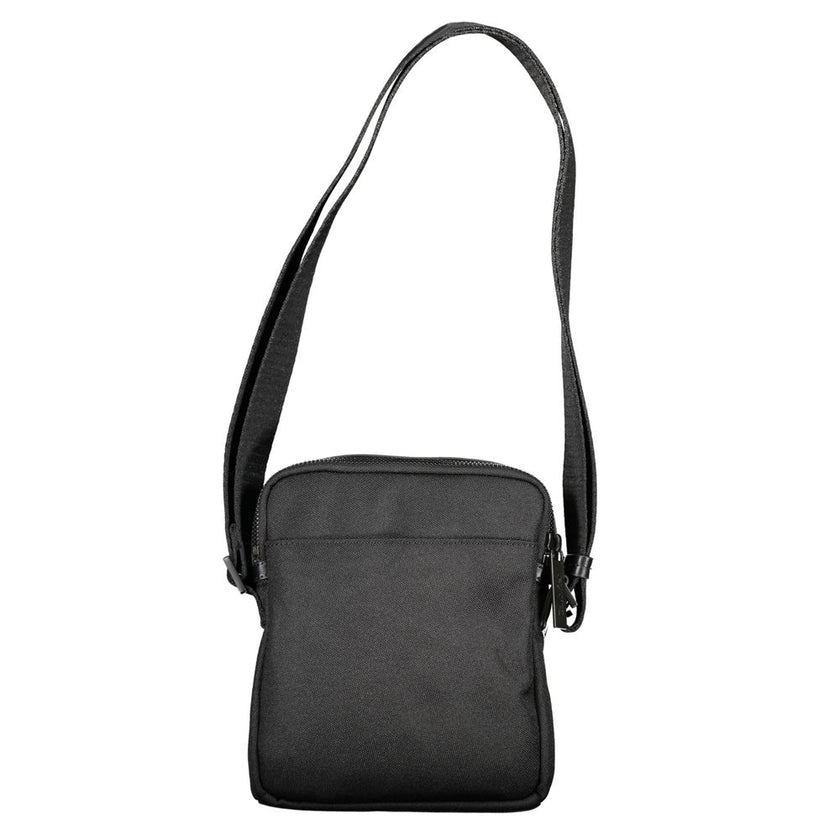 Black Polyester HandbagADJUSTABLE SHOULDER STRAP, 2 EXTERNAL POCKETS, 1 INTERNAL COMPARTMENT FOR I-PAD HOLDER, ZIP CLOSURE, LOGO, 95% POLYESTER RECYCLEDBlack Polyester Handbag${tagsCalvin KleinAulae Black Polyester Handbag Calvin KleinAulae Black Polyeste