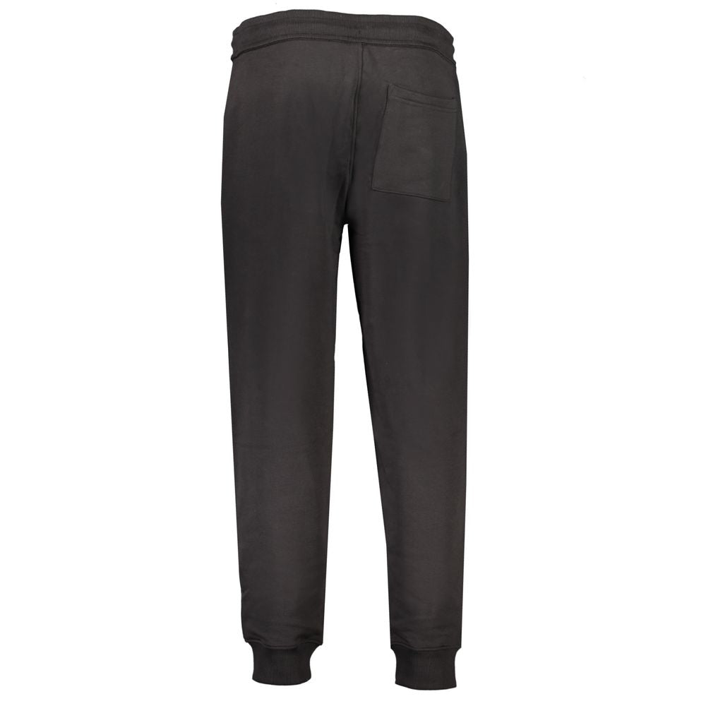 Black Cotton PantSPORTS TROUSERS, BRUSHED, ELASTIC WAIST WITH LACES, ANKLE CUFF, 3 POCKETS, APPLICATION, LOGO, 50% REGENERATIVE COTTONBlack Cotton Pant${tagsCalvin KleinAulae Black Cotton Pant Calvin KleinAulae Black Cotton Pant SPORTS TROUSERS, BRUSHED,