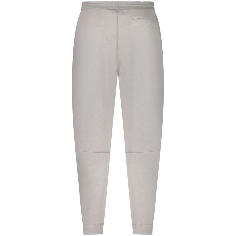 Gray Cotton PantSPORTS TROUSERS, BRUSHED, ELASTIC WAIST WITH LACES, 3 POCKETS, ANKLE CUFF, LOGOGray Cotton Pant${tagsHugo BossAulae Gray Cotton Pant Hugo BossAulae Gray Cotton Pant SPORTS TROUSERS, BRUSHED, ELASTIC WAIST WITH LACES, 3 POCKETS, ANKLE CUFF,