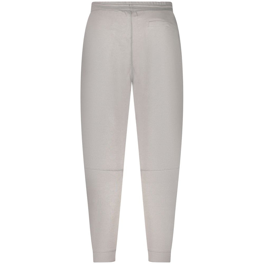Gray Cotton PantSPORTS TROUSERS, BRUSHED, ELASTIC WAIST WITH LACES, 3 POCKETS, ANKLE CUFF, LOGOGray Cotton Pant${tagsHugo BossAulae Gray Cotton Pant Hugo BossAulae Gray Cotton Pant SPORTS TROUSERS, BRUSHED, ELASTIC WAIST WITH LACES, 3 POCKETS, ANKLE CUFF,