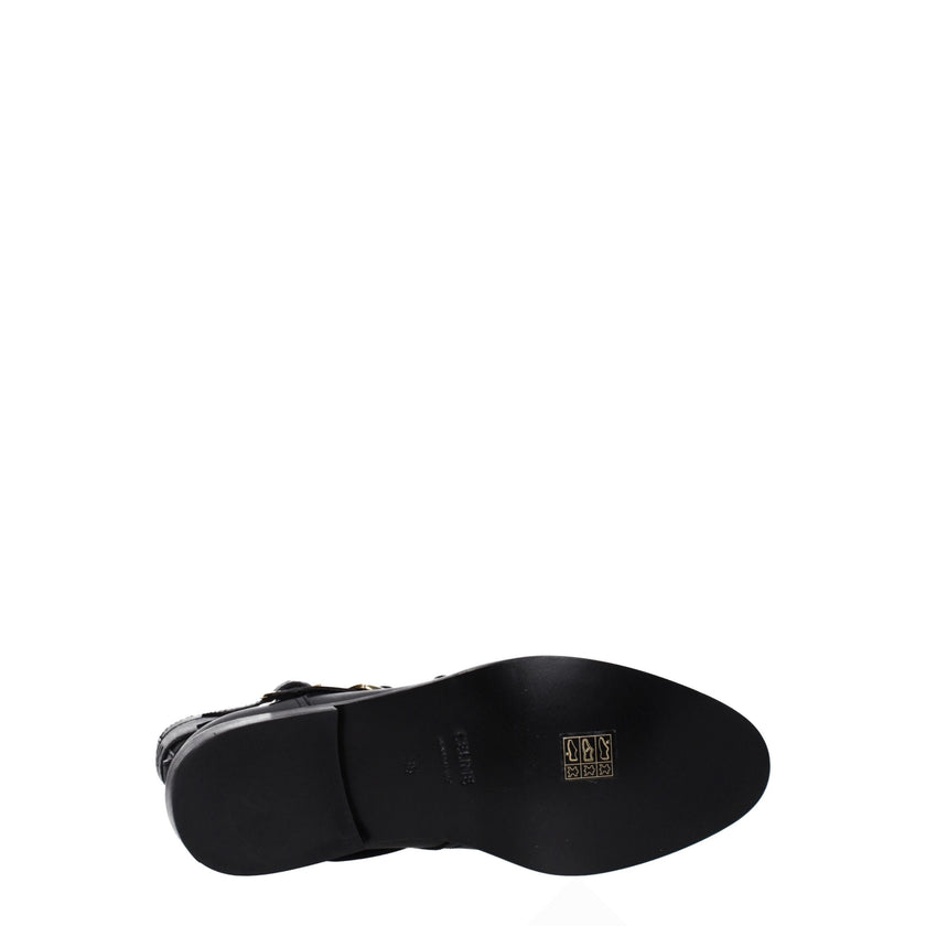 Black Leather Flat BootsDescription: The product with MPN 354983492C38NO and code F78936 leather in black is a boots designed by Celine. It has features like aged effect, vintage effect, side logo. Additional Info: Color details: Gold Style: Casual Materi