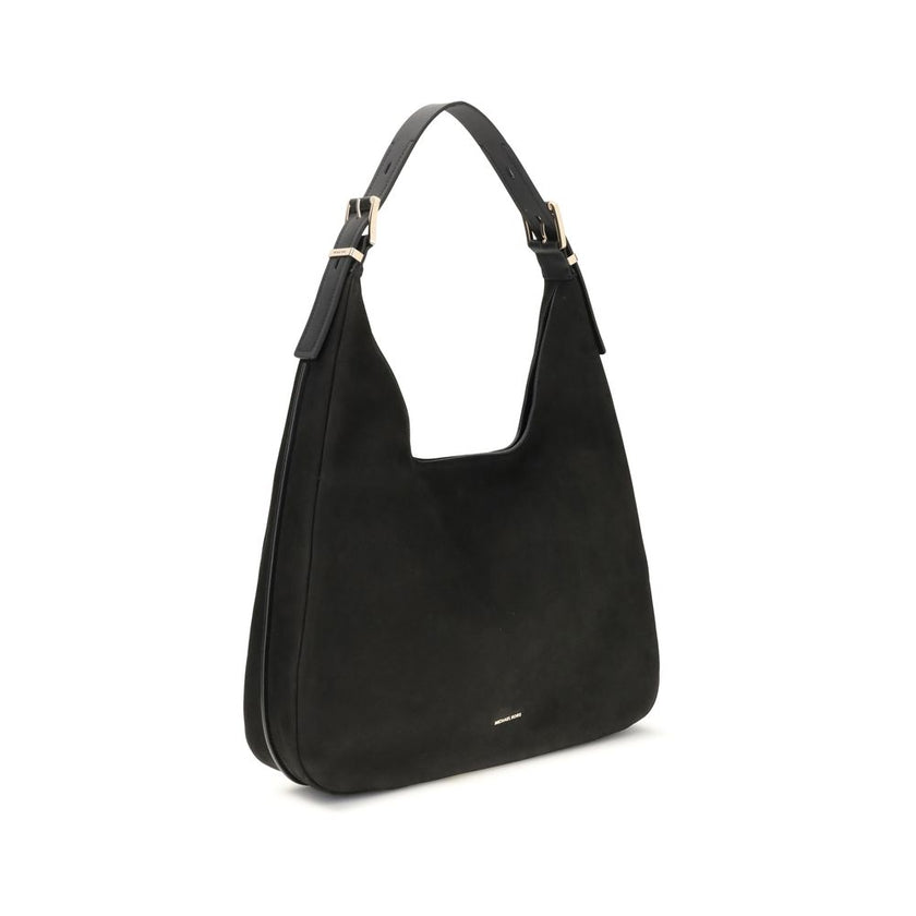 Black Calf Leather Bos Taurus Shoulder BagThe Nolita large Nubuck Shoulder Bag by Michael Kors combines a casual and sophisticated look, thanks to the soft texture of the nubuck and the textured edges that elegantly define its shape. Featuring an adjustab