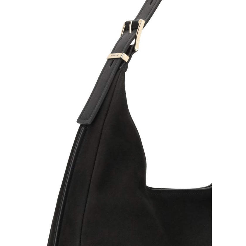 Black Calf Leather Bos Taurus Shoulder BagThe Nolita large Nubuck Shoulder Bag by Michael Kors combines a casual and sophisticated look, thanks to the soft texture of the nubuck and the textured edges that elegantly define its shape. Featuring an adjustab