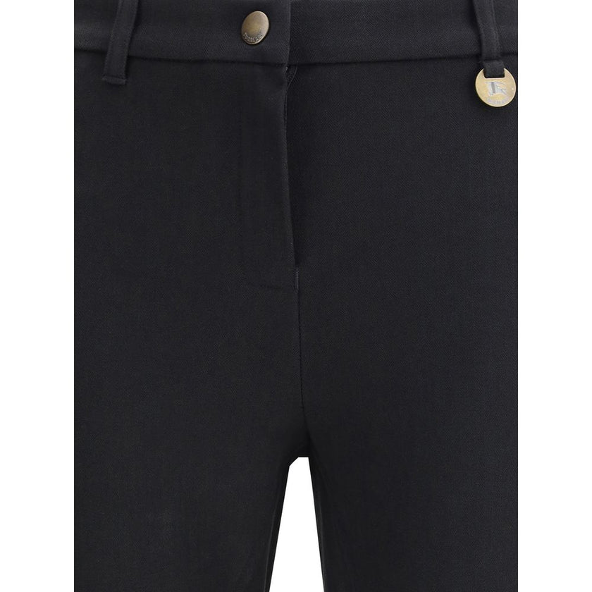 Black Cotton Casual PantsThe Stretch Cotton Jodhpur Trousers by Burberry reinterpret the maison’s equestrian heritage with a modern and elegant twist. The slim fit is highlighted by the delicate herringbone pattern, while the hook-and-zip closure and elas