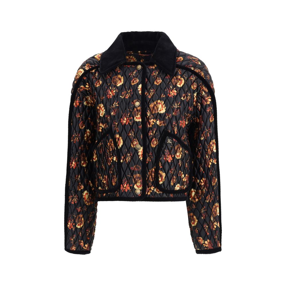 Black Polyamide ClothingThe Floriston Quilted Jacket by Burberry reimagines a British classic with a boxy silhouette in glossy nylon and contrasting corduroy trims. The geranium print, inspired by the Edwardian era, pays tribute to the English garden. Pre