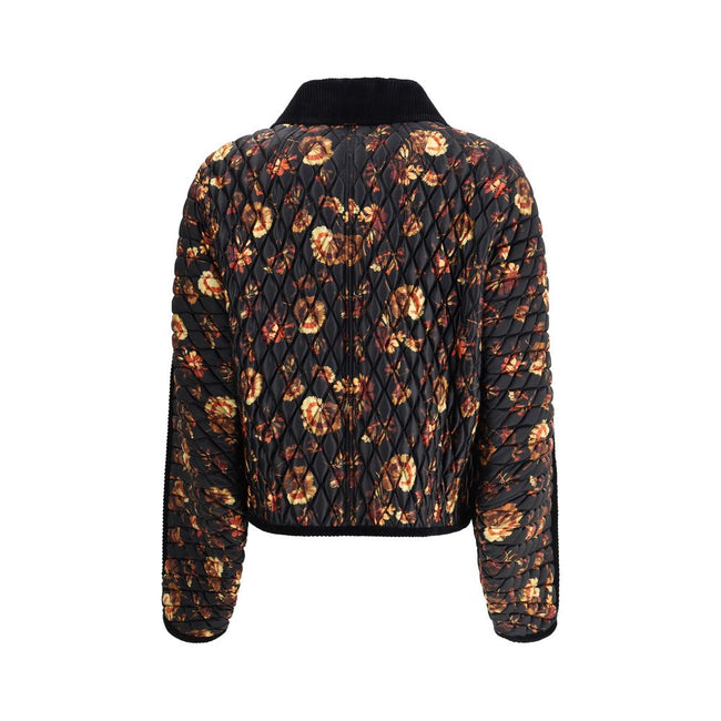 Black Polyamide ClothingThe Floriston Quilted Jacket by Burberry reimagines a British classic with a boxy silhouette in glossy nylon and contrasting corduroy trims. The geranium print, inspired by the Edwardian era, pays tribute to the English garden. Pre