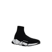 Black Polyester Athletic SneakersThe Speed Sneakers by Balenciaga feature a sock-like design with an elongated toe and a ribbed ankle cuff for snug comfort. The contrasting logo on the outer side lends a distinctive touch, while the notched sole ensures g