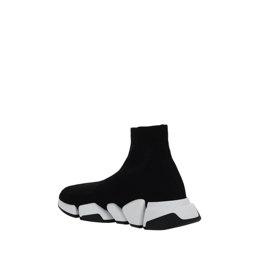 Black Polyester Athletic SneakersThe Speed Sneakers by Balenciaga feature a sock-like design with an elongated toe and a ribbed ankle cuff for snug comfort. The contrasting logo on the outer side lends a distinctive touch, while the notched sole ensures g