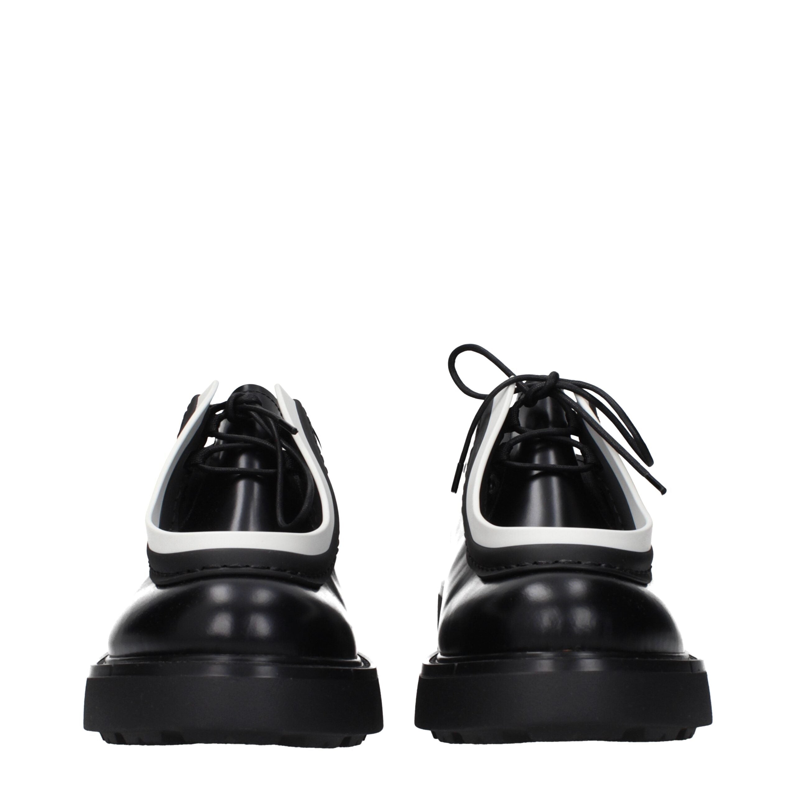 Black Leather Oxfords And DerbiesDescription: The product with MPN 1E280N055050F0967 and code F84747 leather in black is a lace up and monkstrap designed by Prada. It has features like side logo.Black Leather Oxfords And Derbies${tagsPradaAulae Black Leat