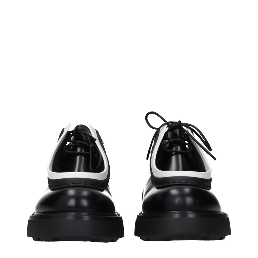Black Leather Oxfords And DerbiesDescription: The product with MPN 1E280N055050F0967 and code F84747 leather in black is a lace up and monkstrap designed by Prada. It has features like side logo.Black Leather Oxfords And Derbies${tagsPradaAulae Black Leat