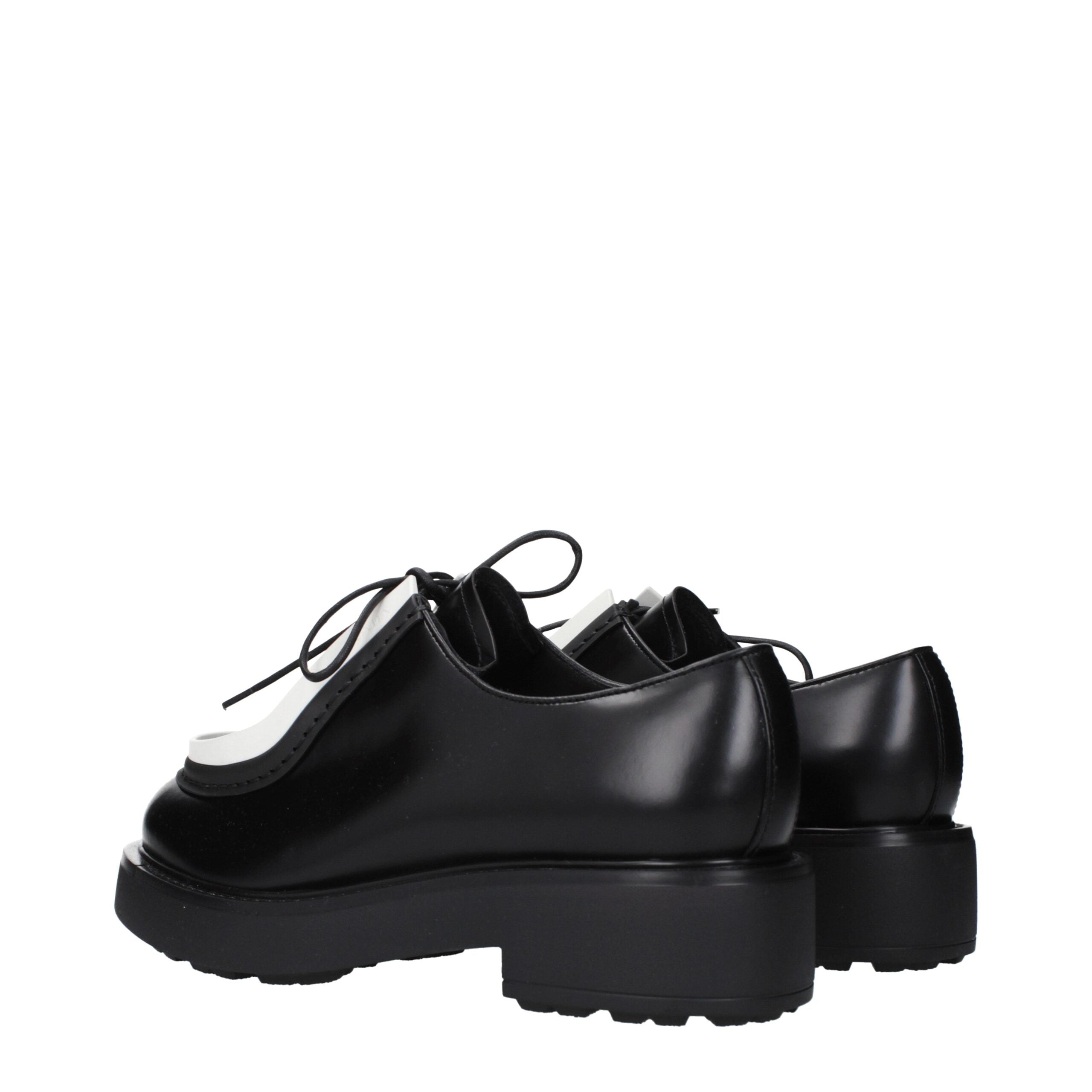 Black Leather Oxfords And DerbiesDescription: The product with MPN 1E280N055050F0967 and code F84747 leather in black is a lace up and monkstrap designed by Prada. It has features like side logo.Black Leather Oxfords And Derbies${tagsPradaAulae Black Leat