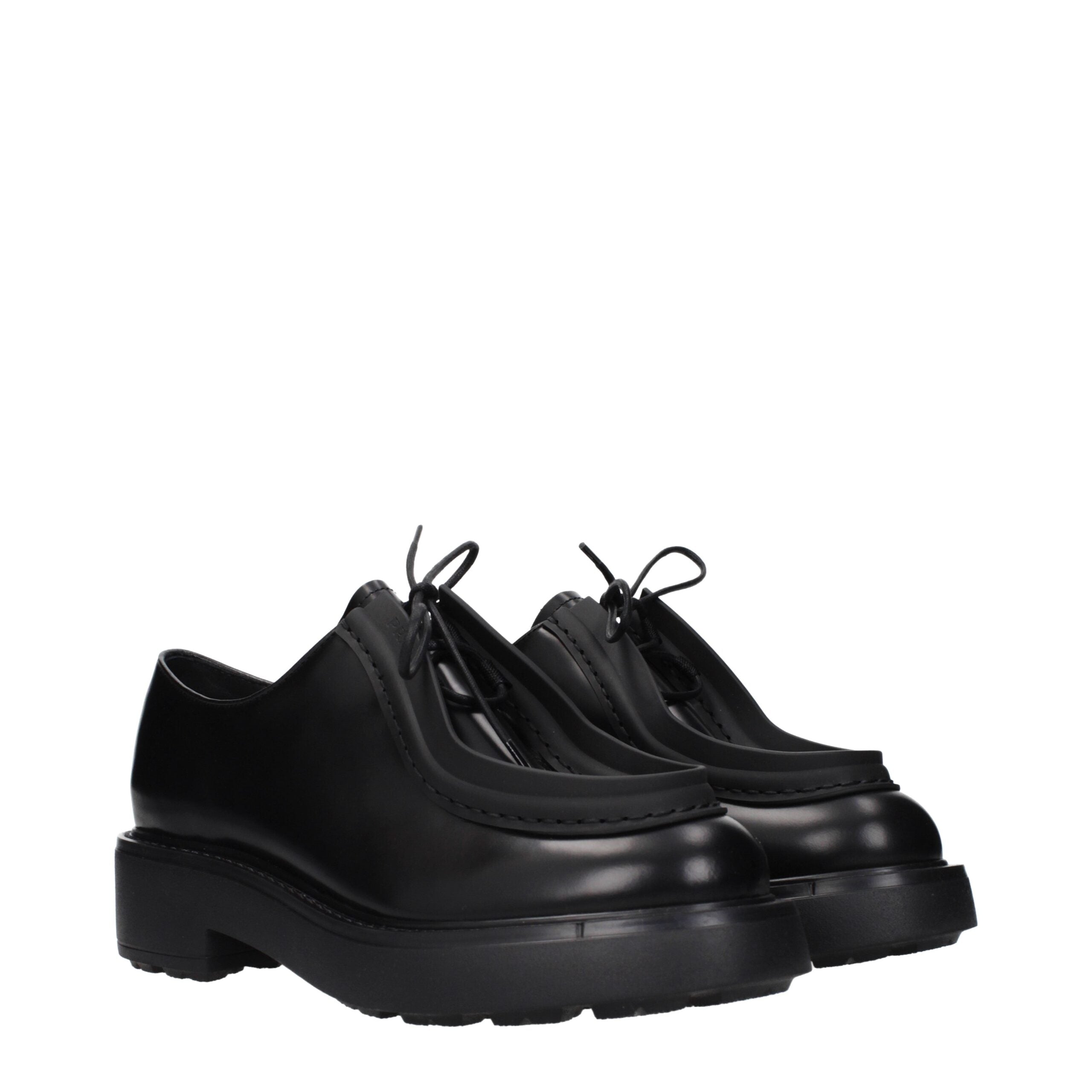 Black Leather Oxfords And DerbiesDescription: The product with MPN 1E280N055050F0002 and code F84747 leather in black is a lace up and monkstrap designed by Prada. It has features like side logo.Black Leather Oxfords And Derbies${tagsPradaAulae Black Leat