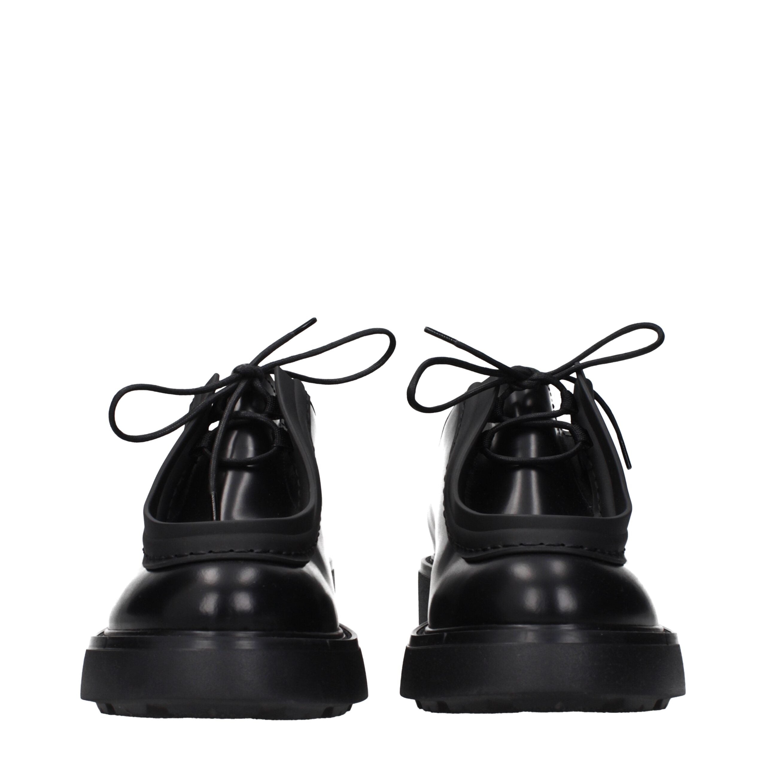 Black Leather Oxfords And DerbiesDescription: The product with MPN 1E280N055050F0002 and code F84747 leather in black is a lace up and monkstrap designed by Prada. It has features like side logo.Black Leather Oxfords And Derbies${tagsPradaAulae Black Leat