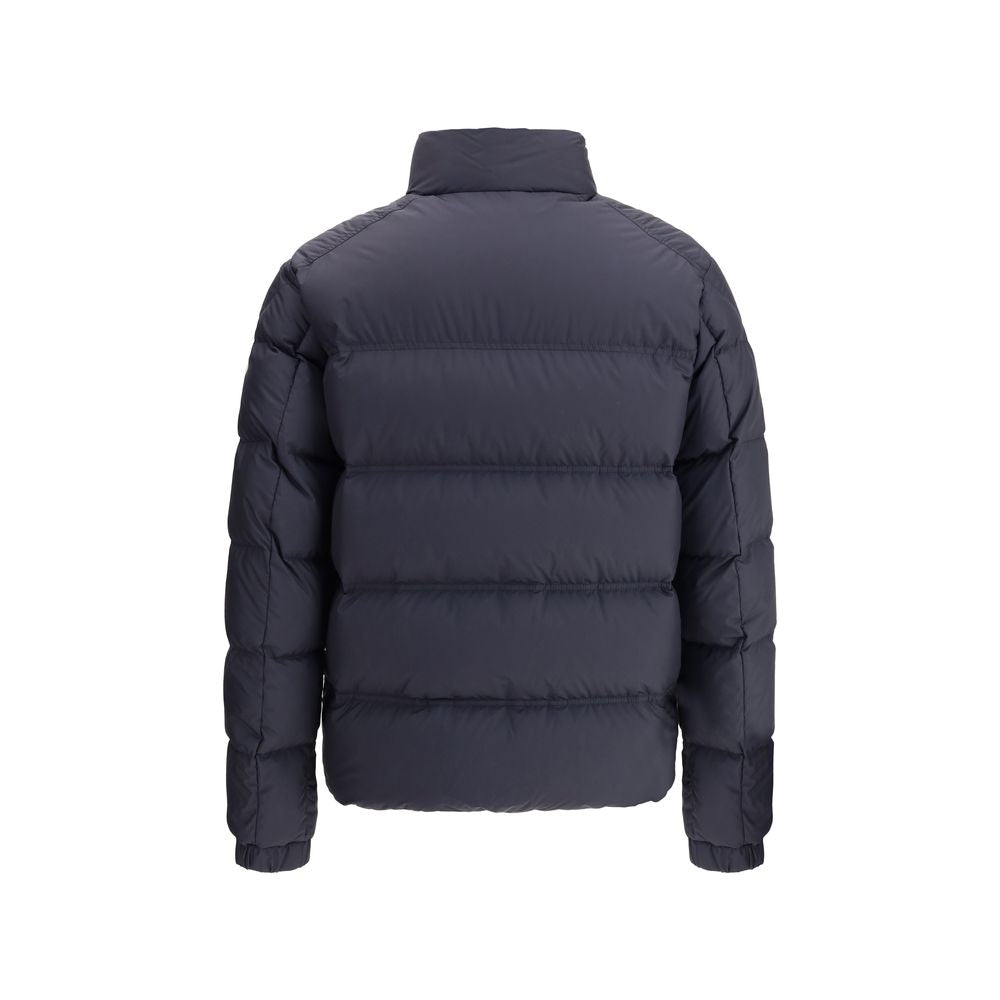Bouvaque Down JacketBouvaque Down Jacket by Moncler combines sporty style and iconic details. Featuring an essential design, it features the logo patch on the left sleeve, zipper closure, two side welt pockets and elastic cuffs. The standing collar offers