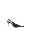 Black Calf Leather Bos Taurus PumpsSaint Laurent’s leather Babylone Pumps express bold and sophisticated femininity. Featuring an elongated toe with elegant cut-out details, they are embellished with the iconic YSL metallic element applied to the front. T