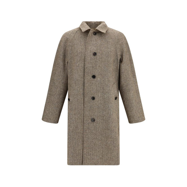 Brown Cotton CoatThe Chevington Reversible Coat by Burberry is crafted from cotton and finished with a clean design that balances functionality and style. Featuring a classic collar, long sleeves, and a button front closure, it stands out for its reversib