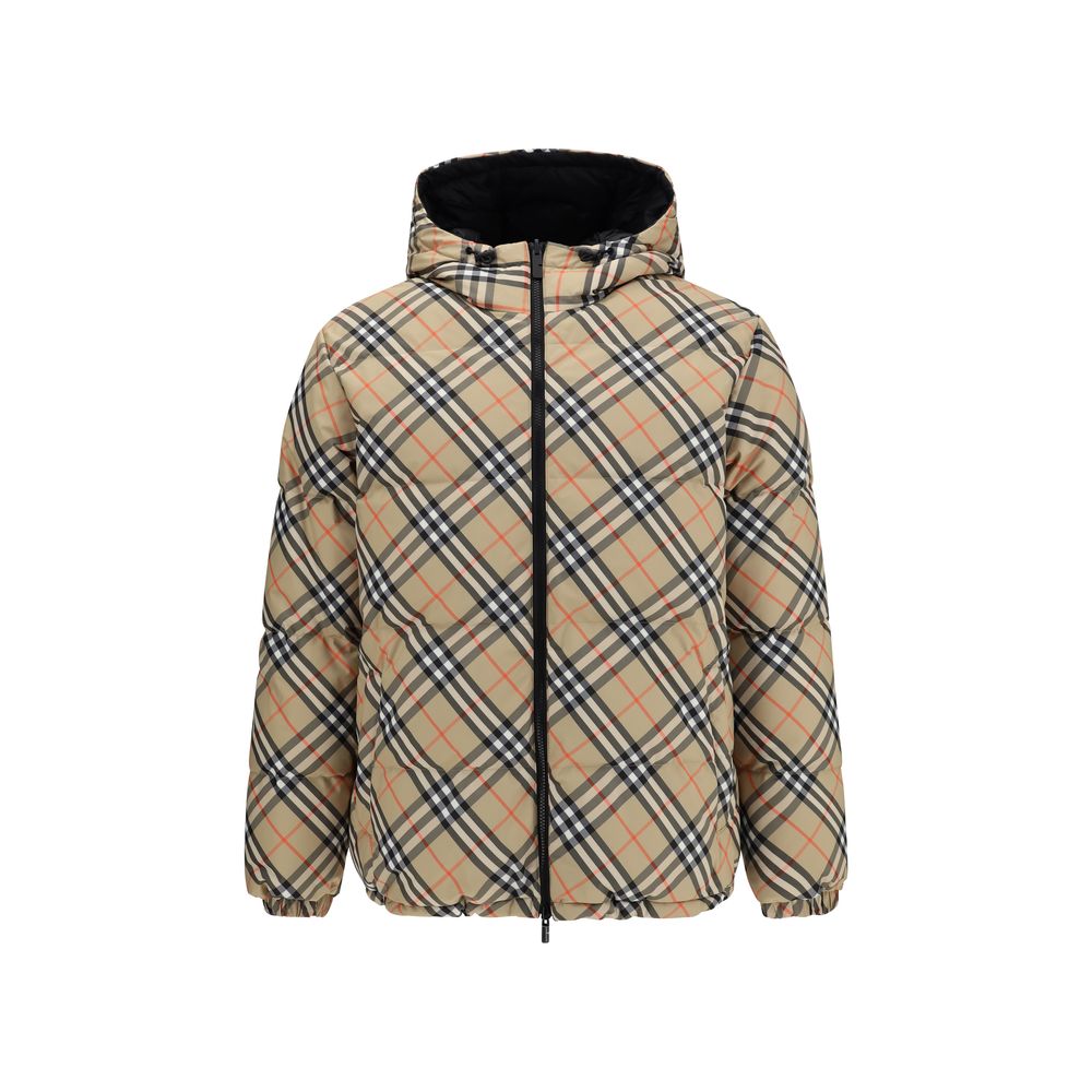 Black Polyester CoatThe Detachable Sleeve Puffer Jacket by Burberry blends versatility with heritage. Filled with goose down and insulating fibres, the design features detachable sleeves that transform it from a jacket into a gilet. Cut to a relaxed fit,