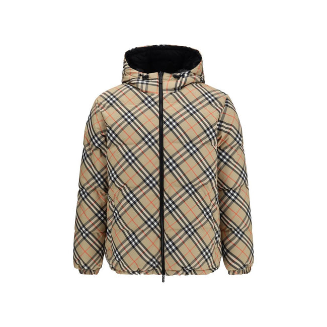 Black Polyester CoatThe Detachable Sleeve Puffer Jacket by Burberry blends versatility with heritage. Filled with goose down and insulating fibres, the design features detachable sleeves that transform it from a jacket into a gilet. Cut to a relaxed fit,