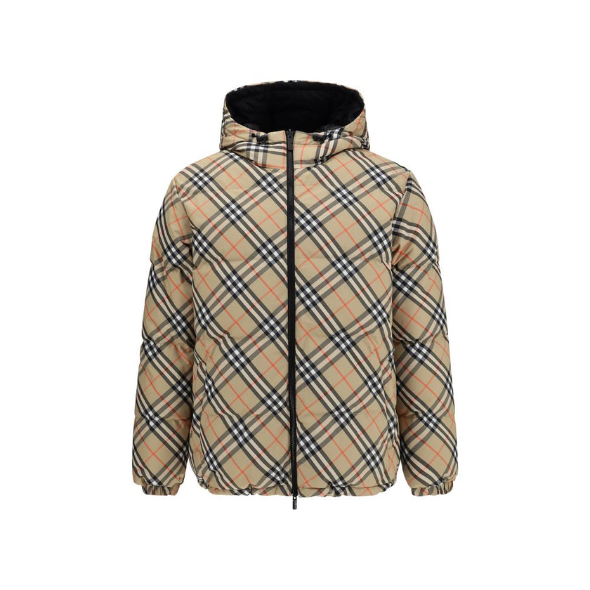 Black Polyester CoatThe Detachable Sleeve Puffer Jacket by Burberry blends versatility with heritage. Filled with goose down and insulating fibres, the design features detachable sleeves that transform it from a jacket into a gilet. Cut to a relaxed fit,
