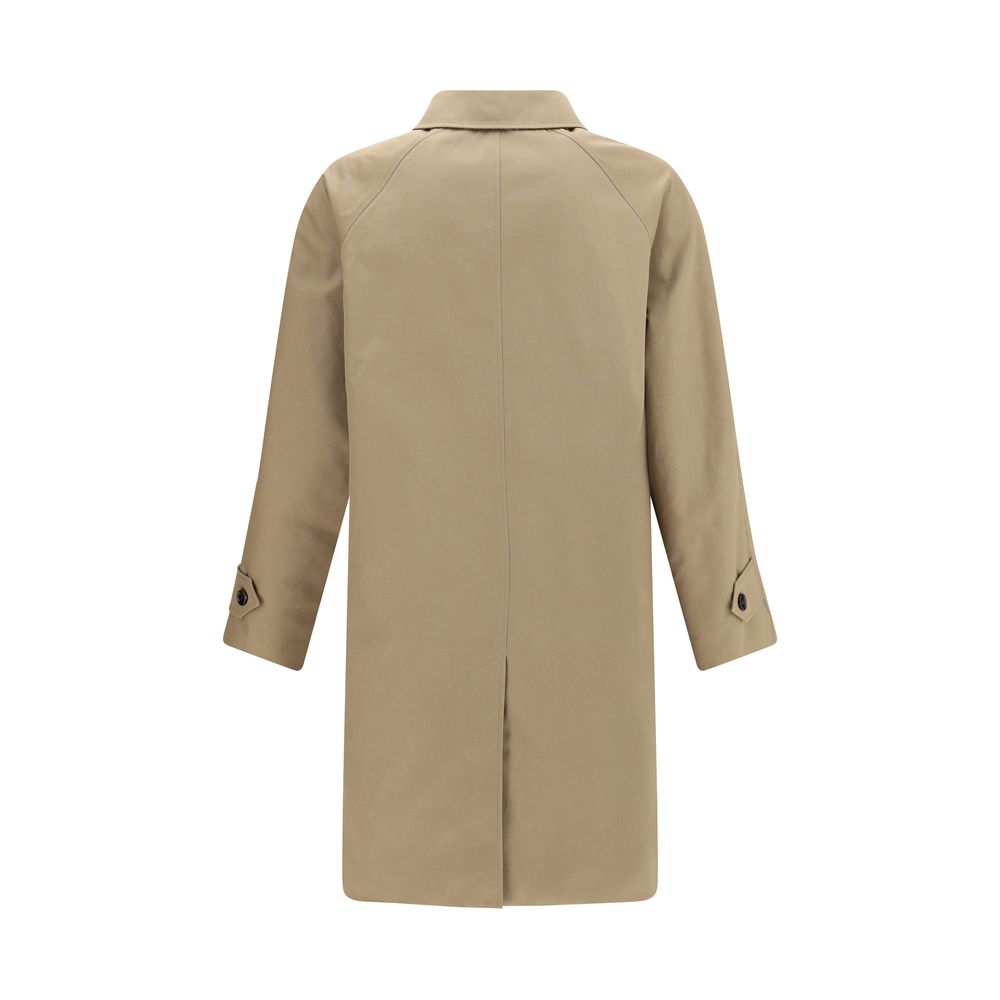 Brown Cotton CoatThe Chevington Reversible Coat by Burberry is crafted from cotton and finished with a clean design that balances functionality and style. Featuring a classic collar, long sleeves, and a button front closure, it stands out for its reversib
