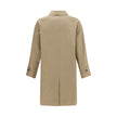 Brown Cotton CoatThe Chevington Reversible Coat by Burberry is crafted from cotton and finished with a clean design that balances functionality and style. Featuring a classic collar, long sleeves, and a button front closure, it stands out for its reversib