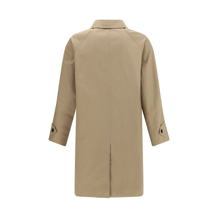 Brown Cotton CoatThe Chevington Reversible Coat by Burberry is crafted from cotton and finished with a clean design that balances functionality and style. Featuring a classic collar, long sleeves, and a button front closure, it stands out for its reversib