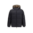 Black Polyester CoatThe Detachable Sleeve Puffer Jacket by Burberry blends versatility with heritage. Filled with goose down and insulating fibres, the design features detachable sleeves that transform it from a jacket into a gilet. Cut to a relaxed fit,