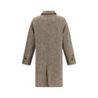 Brown Cotton CoatThe Chevington Reversible Coat by Burberry is crafted from cotton and finished with a clean design that balances functionality and style. Featuring a classic collar, long sleeves, and a button front closure, it stands out for its reversib