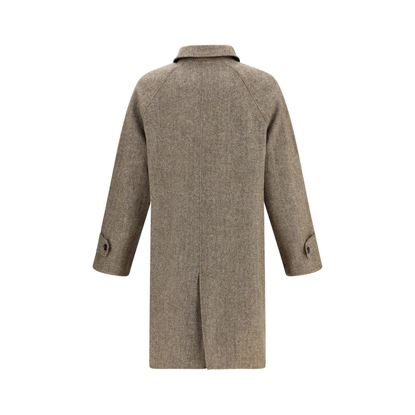 Brown Cotton CoatThe Chevington Reversible Coat by Burberry is crafted from cotton and finished with a clean design that balances functionality and style. Featuring a classic collar, long sleeves, and a button front closure, it stands out for its reversib