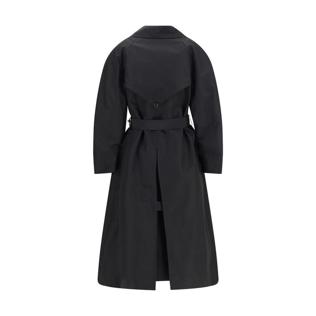 Black Polyester CoatThe Zake Trench coat from the Moncler x EE72 collection by Edward Enninful is crafted from technical 3L Polyester with Nylon laqué sleeve lining, it combines durability with comfort. The design features a button closure, welt pockets,