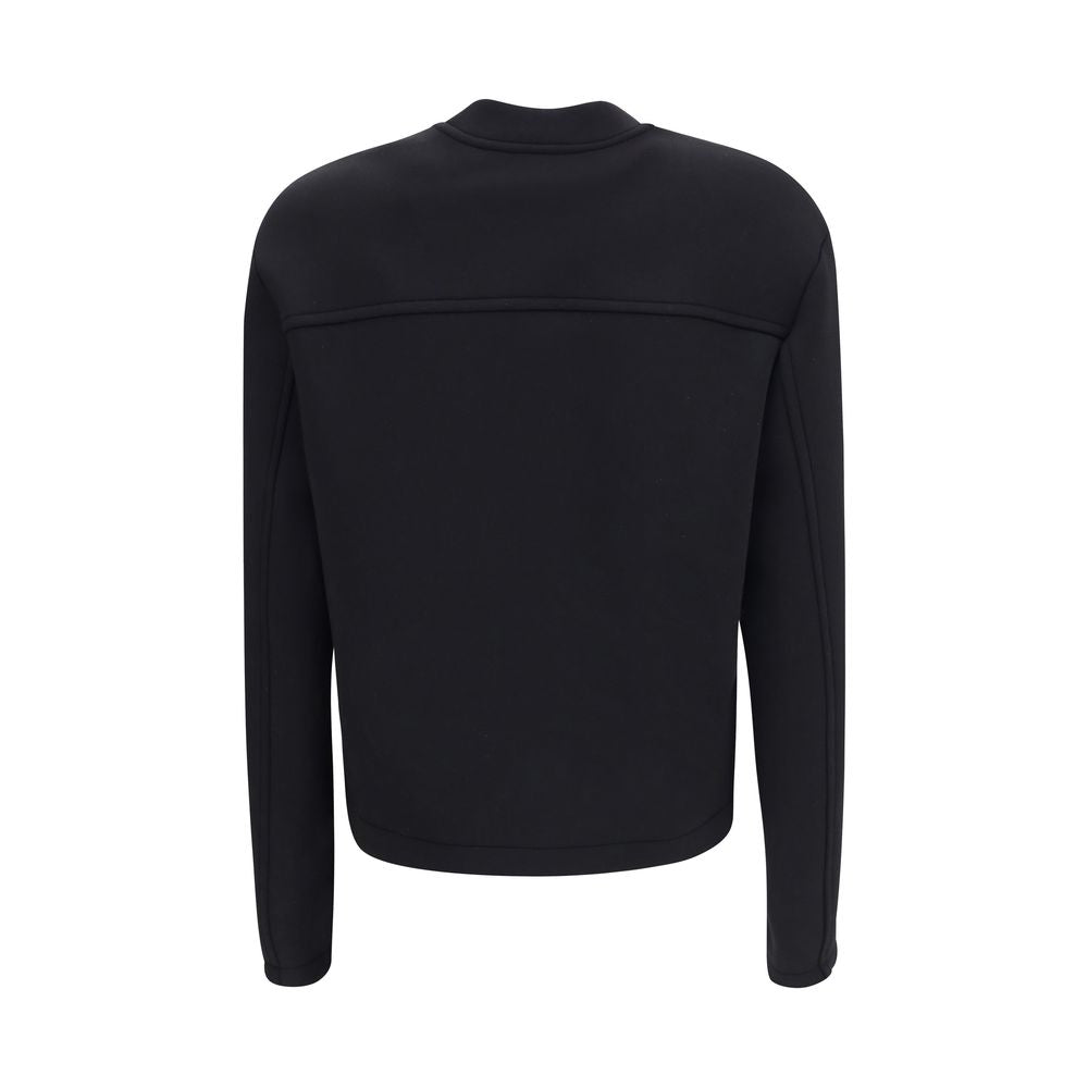 Black Viscose SweatshirtThe Sweatshirt by Moncler x EE72 by Edward Enninful reflects the futuristic style of the collection, combining clean lines with innovative materials. Crafted from Viscose and Neoprene, it features a crew neck design with long sleev