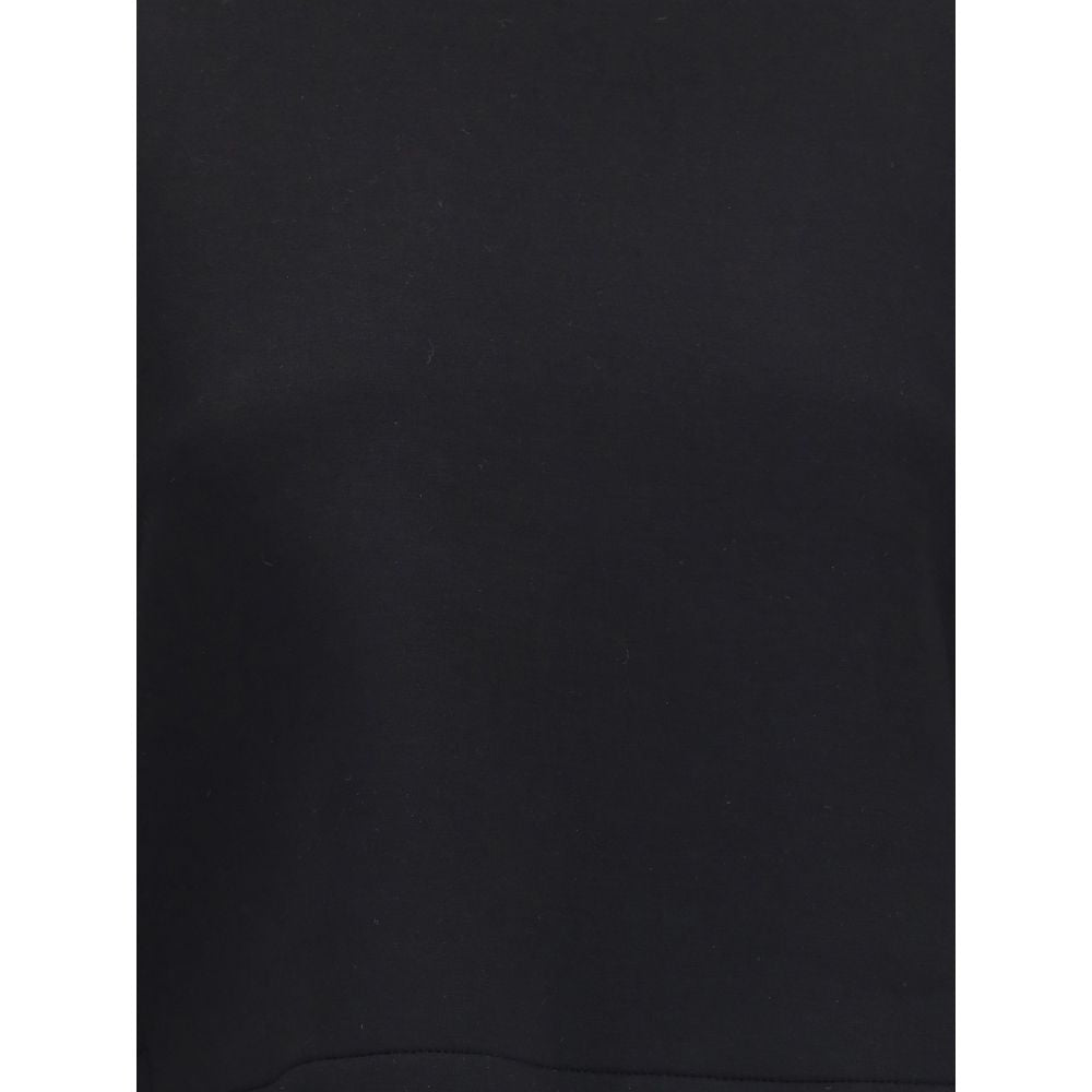 Black Viscose SweatshirtThe Sweatshirt by Moncler x EE72 by Edward Enninful reflects the futuristic style of the collection, combining clean lines with innovative materials. Crafted from Viscose and Neoprene, it features a crew neck design with long sleev