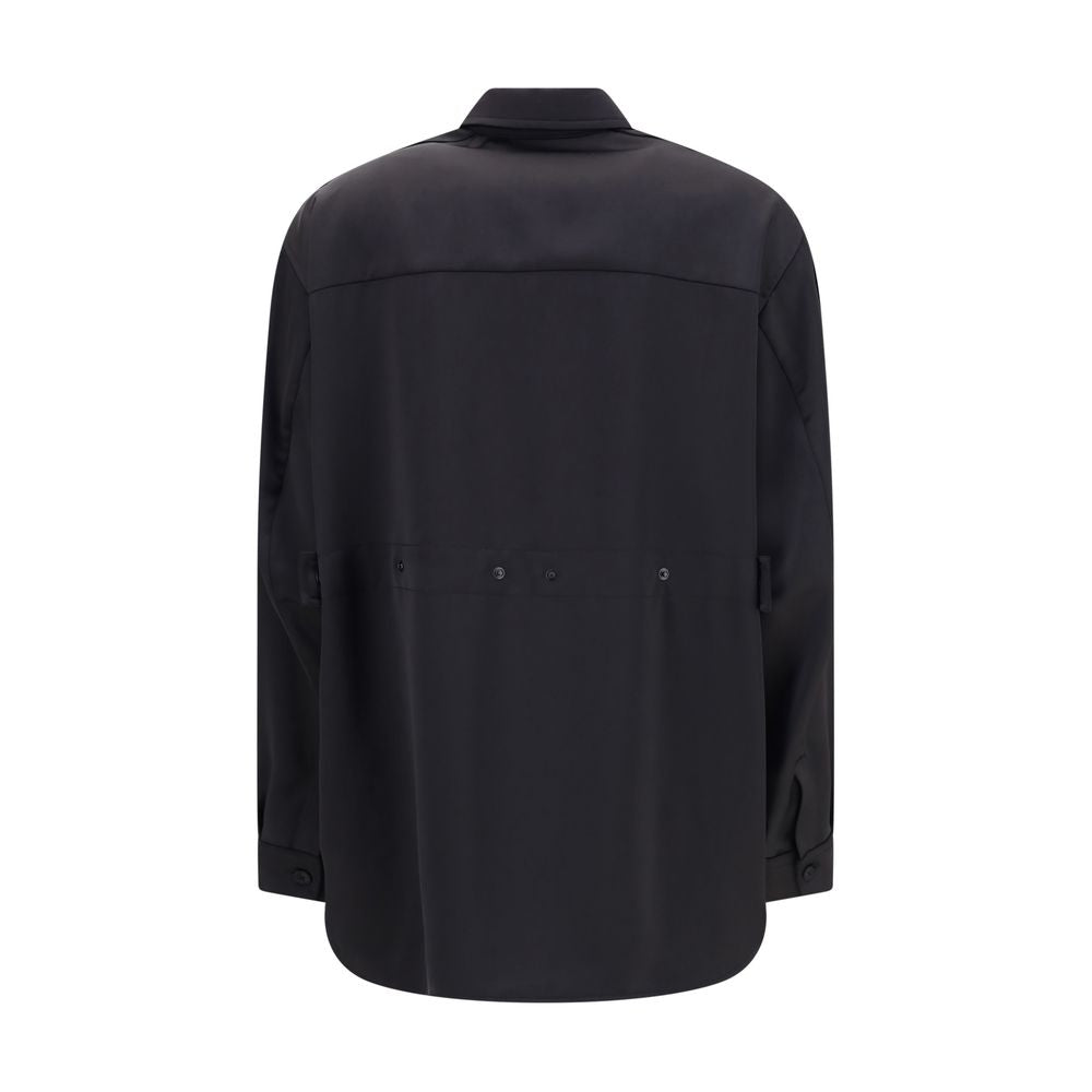 Black Polyester Dress ShirtThe Shirt in Technical Polyester Satin Moncler x EE72 collection by Edward Enninful and finished with a nylon laqué yoke lining, it features a classic shirt collar, button closure, adjustable cuffs, and a back strap with snap bu