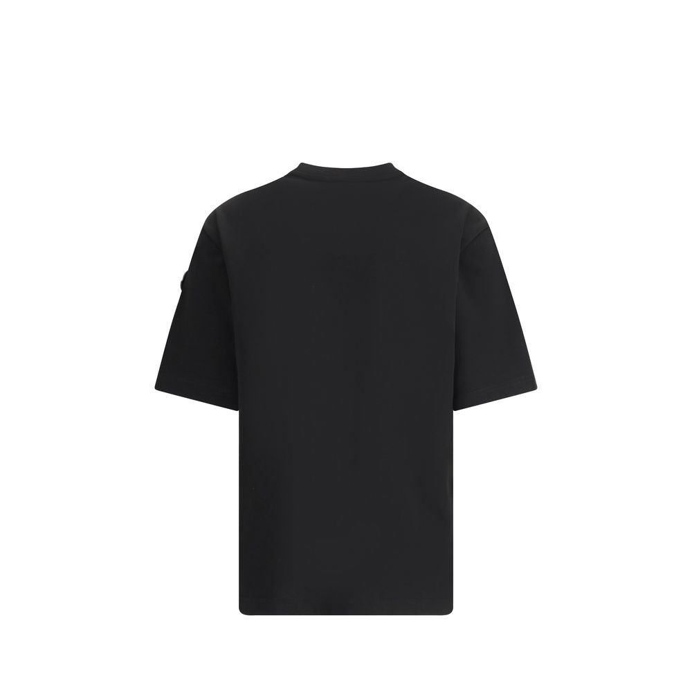 Black Cotton SportswearThe T-shirt by Moncler x EE72 by Edward Enninful is crafted from soft cotton jersey and reflects the iconic style of the collection. The ribbed crew neck and short sleeves provide an essential and versatile fit, while the unmistakab