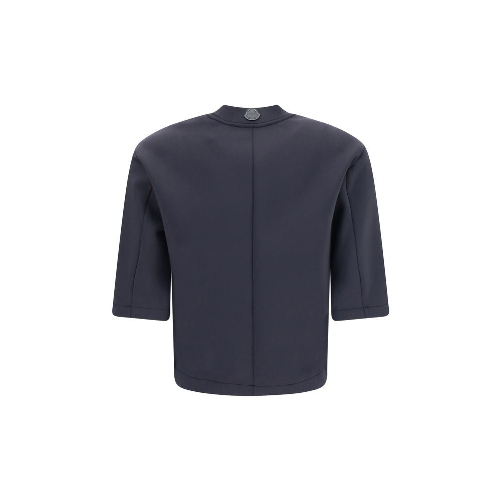 Black Polyester T-ShirtThe T-shirt by Moncler x EE72 by Edward Enninful embodies the understated elegance of the collection. Crafted from neoprene, it features a clean crew neck and short sleeves that enhance its modern silhouette. The design is completed